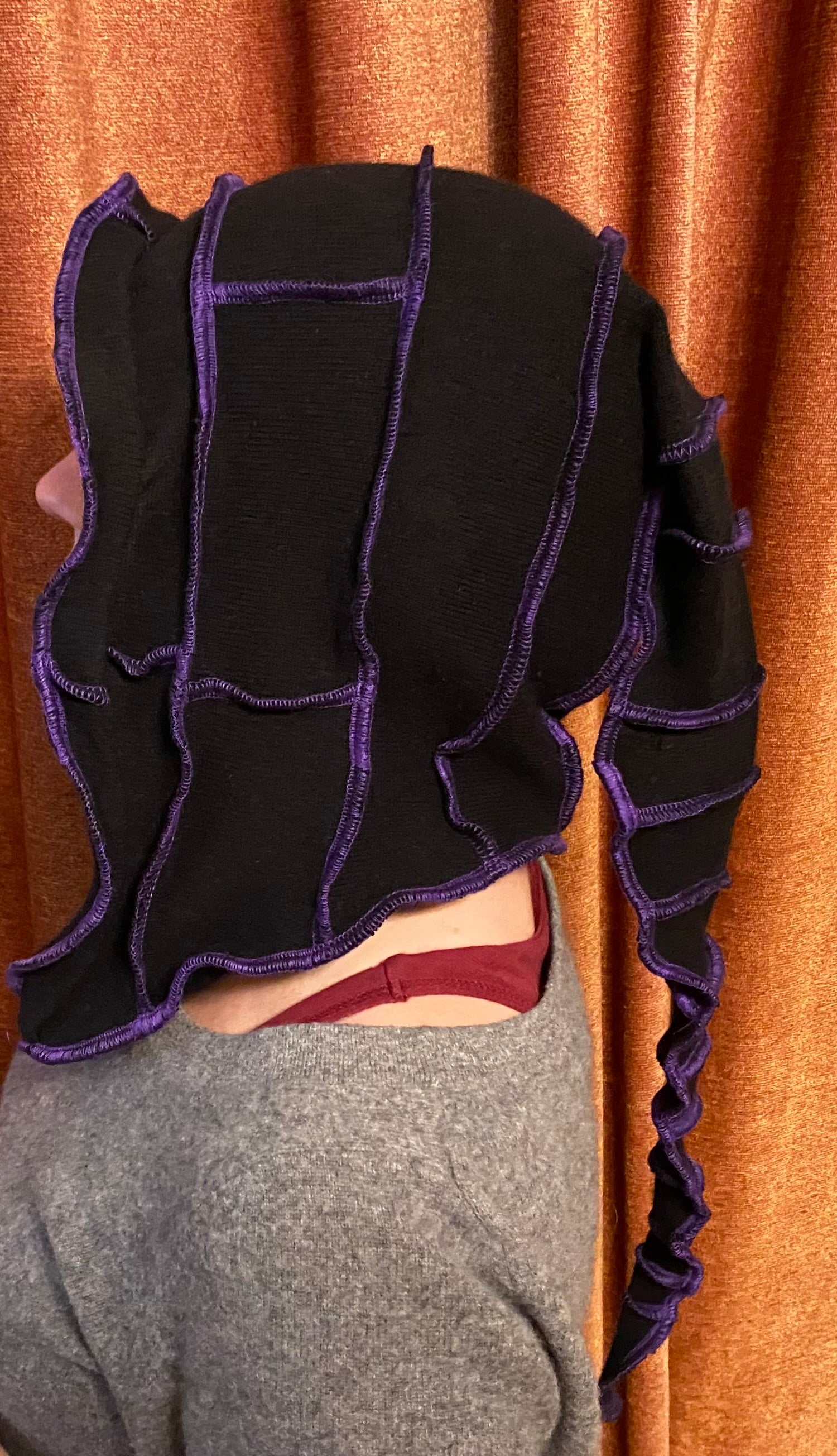 Black cashmere hood with purple thread accents