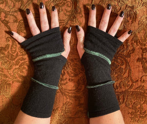 Black cashmere arm warmers with green thread accents