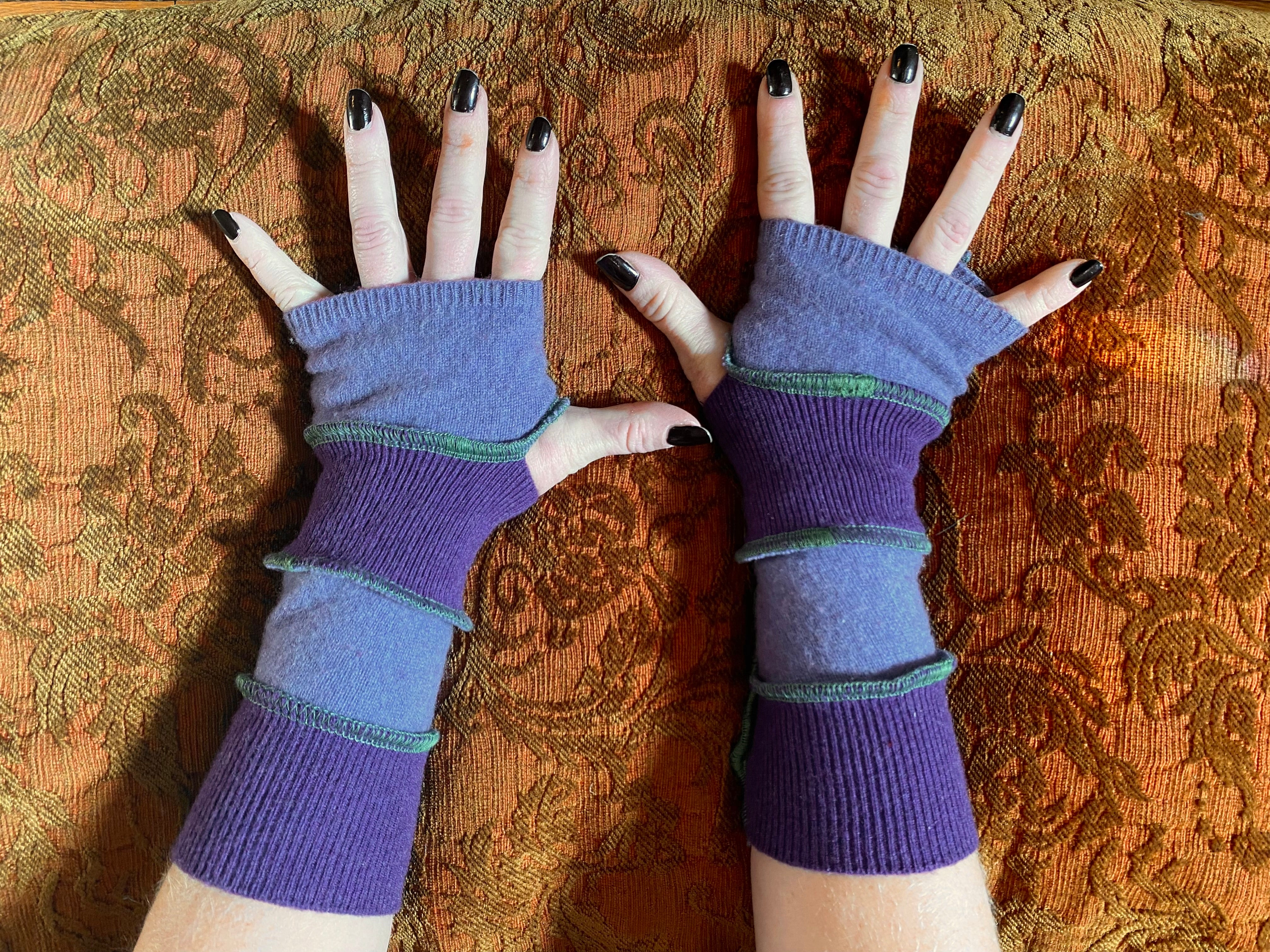 Lavender and purple cashmere arm warmers with green thread accents