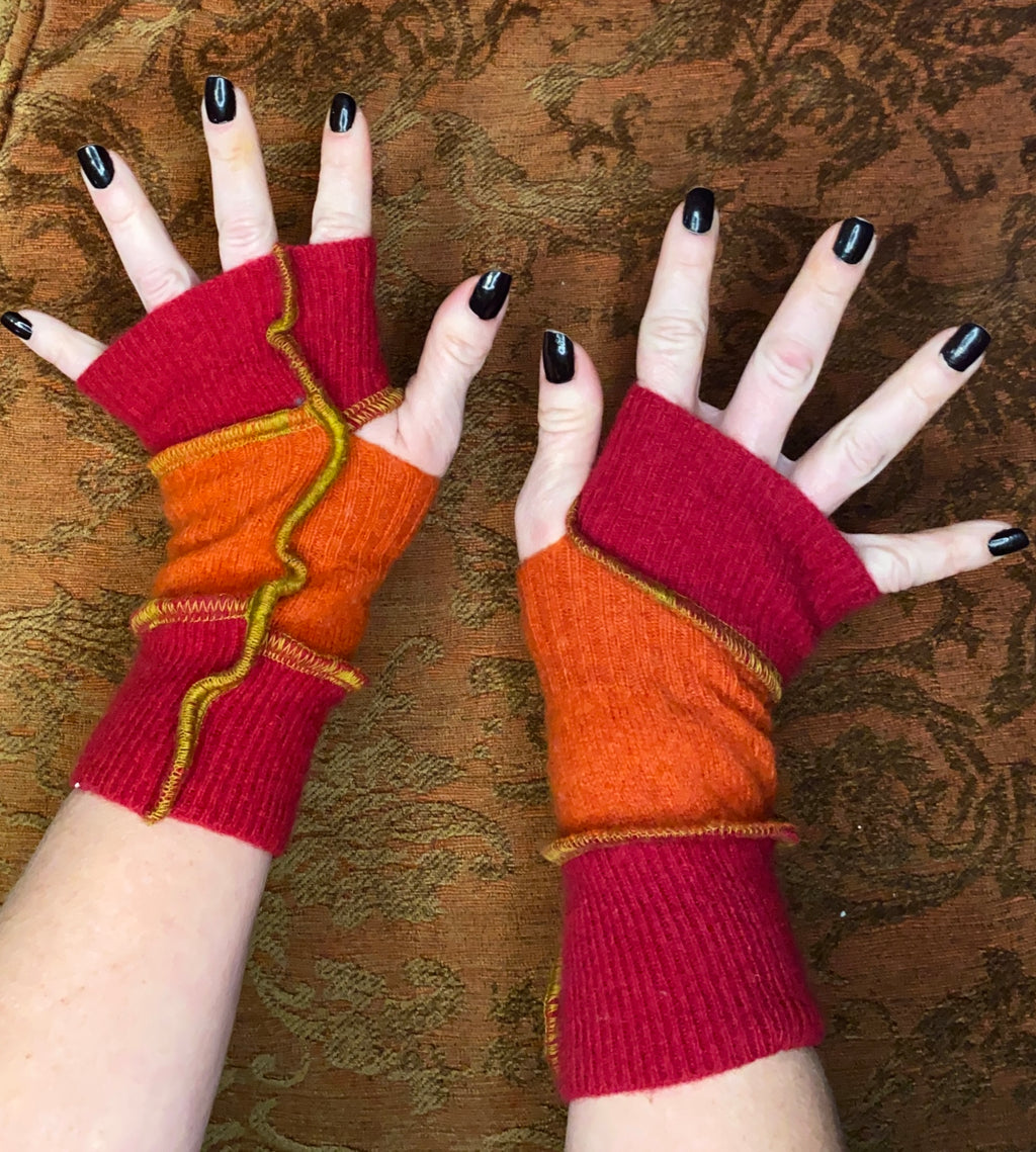 Orange and red cashmeres with green armwarmers with gold thread accents