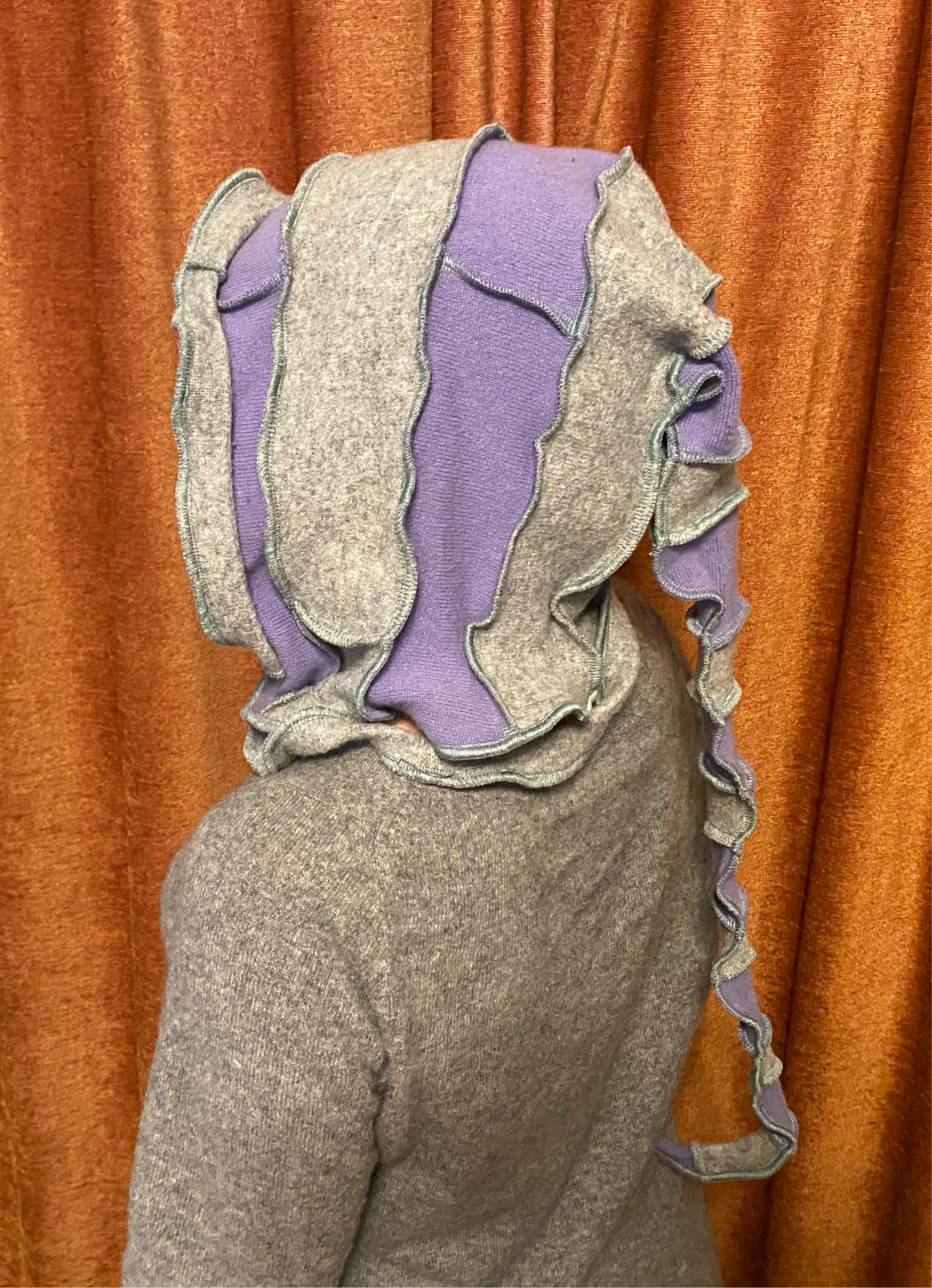 Grey and lavender cashmere hood with seafoam green thread accents