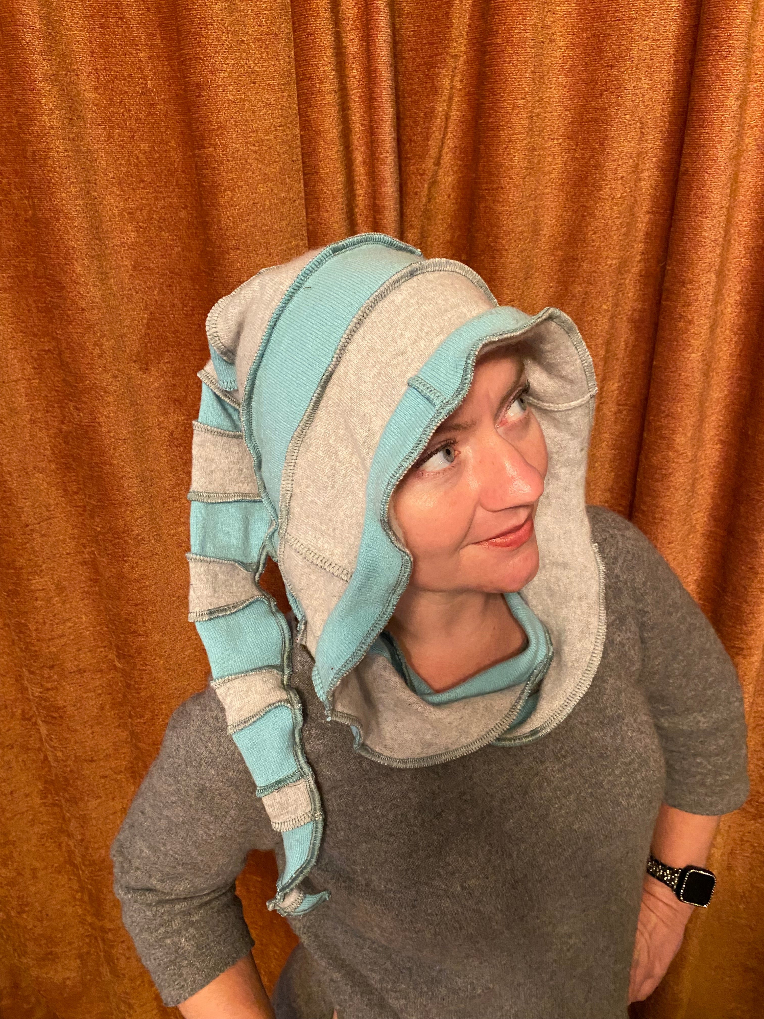 Light blue and grey cashmere hood with seafoam green thread accents